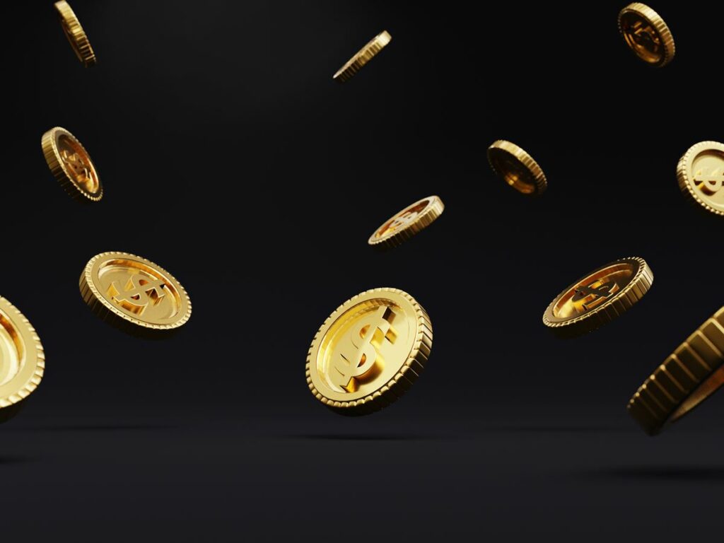 Closeup of golden USD coins dropping on dark background , Dollar is the main currency exchange and payment in the world by 3d render.