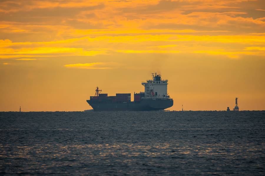 Logistics import export Container Cargo ship in seaport on sunset sky, Freight Transportation by container ship boat