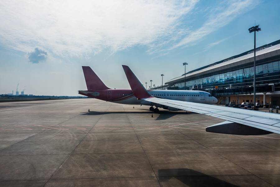 planes on runway in modern airport of China.