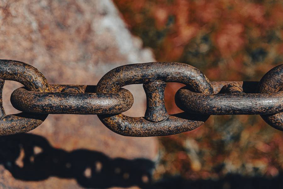 Photo of chain on stone