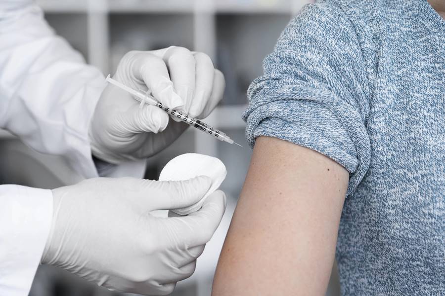 woman-getting-vaccine-shot-by-doctor