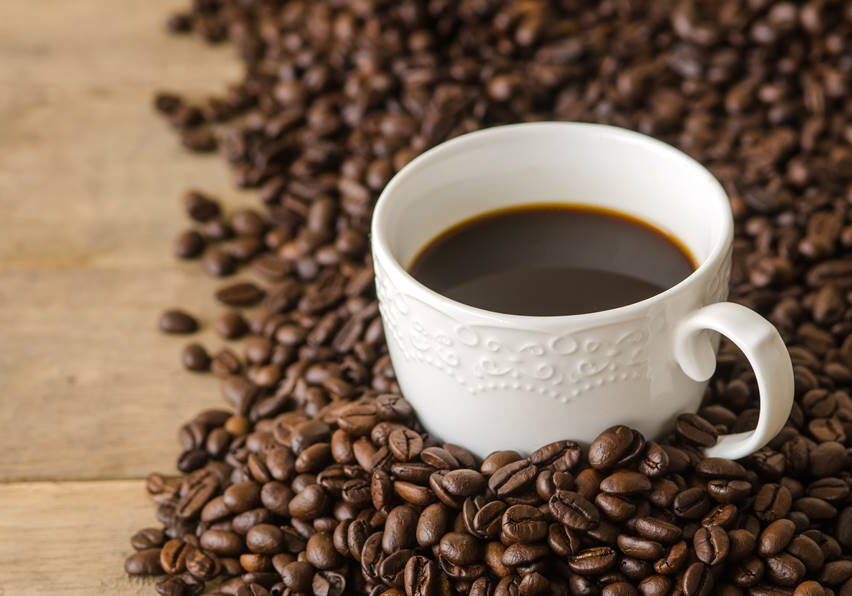 coffee cup with coffee beans