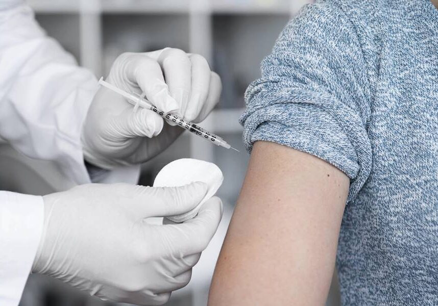 woman-getting-vaccine-shot-by-doctor